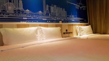 Deluxe Triple Room, 1 Bedroom, Non Smoking | Premium bedding, down comforters, pillowtop beds, free minibar