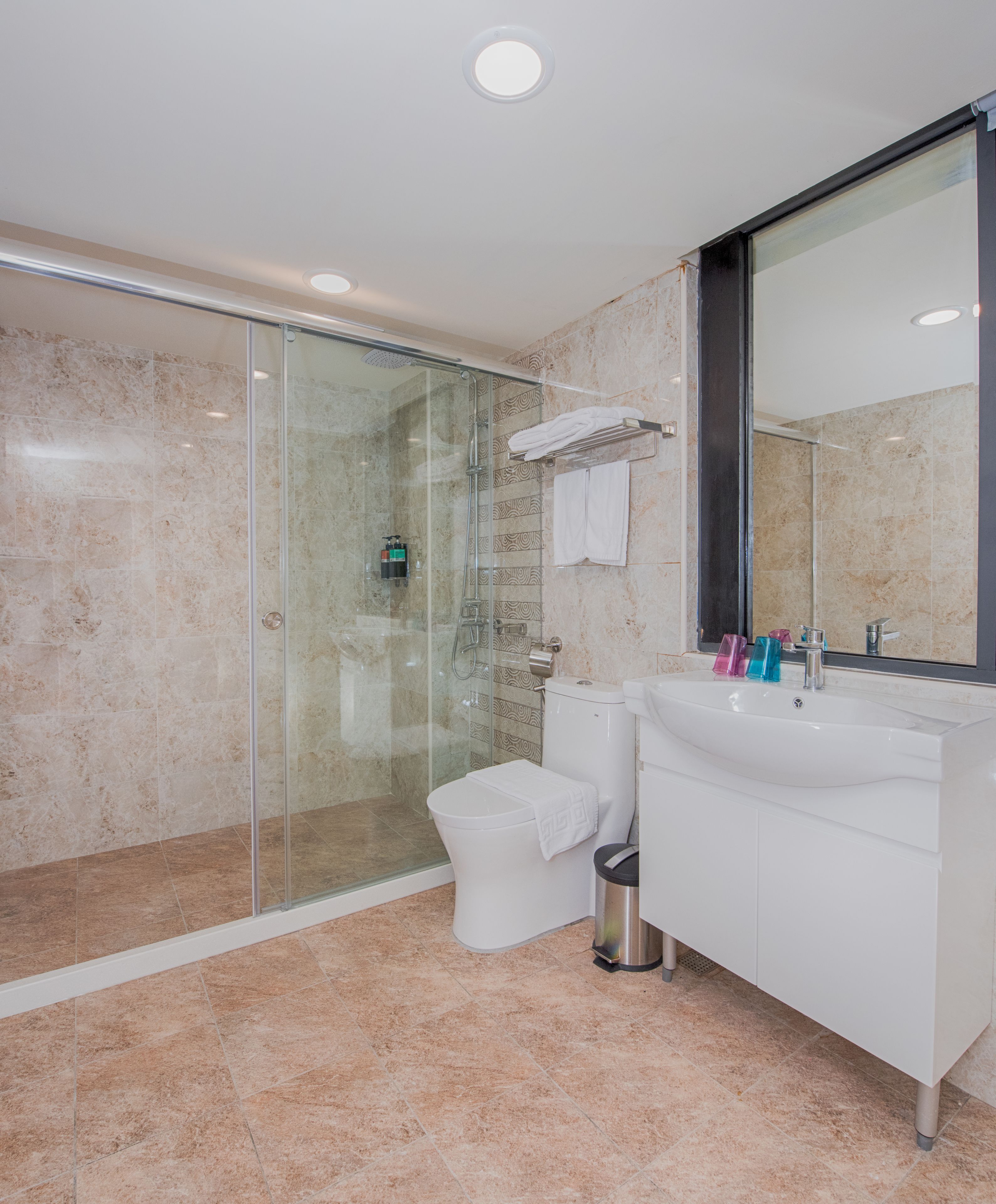 premium quadruple room, 1 bedroom, non smoking | bathroom | shower, rainfall showerhead, free toiletries, hair dryer