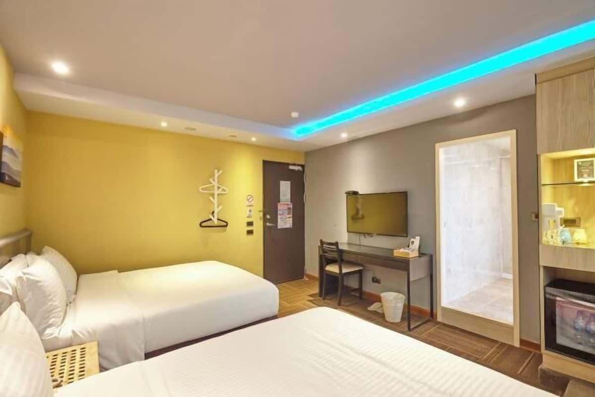 Premium bedding, down duvets, pillow-top beds, free minibar