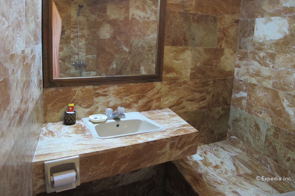 family room with side sea view | bathroom sink