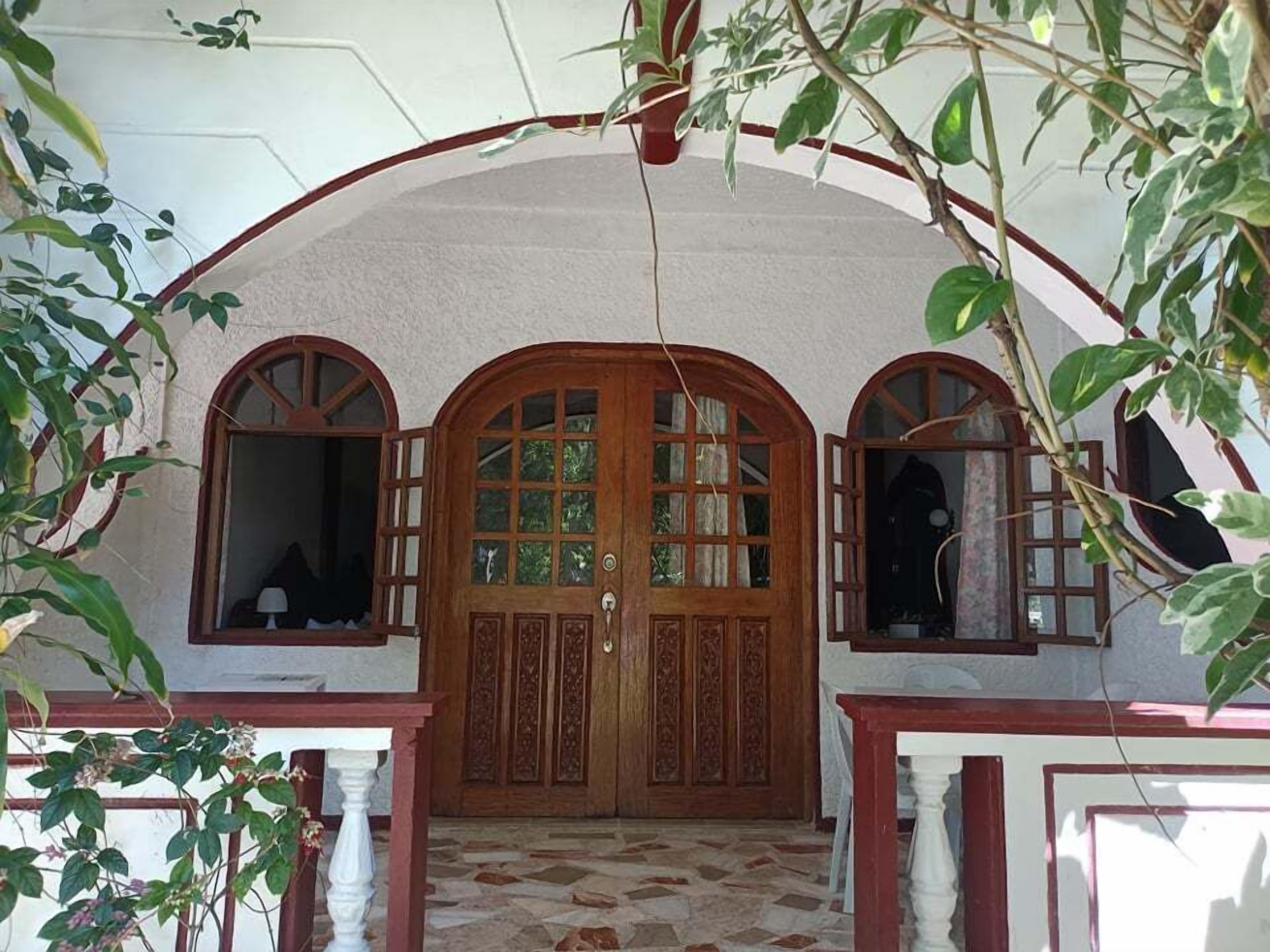 family room with side sea view | terrace/patio
