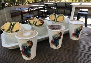 Breakfast, lunch, dinner served; local cuisine, al fresco dining 