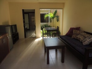 32-inch flat-screen TV with cable channels, TV