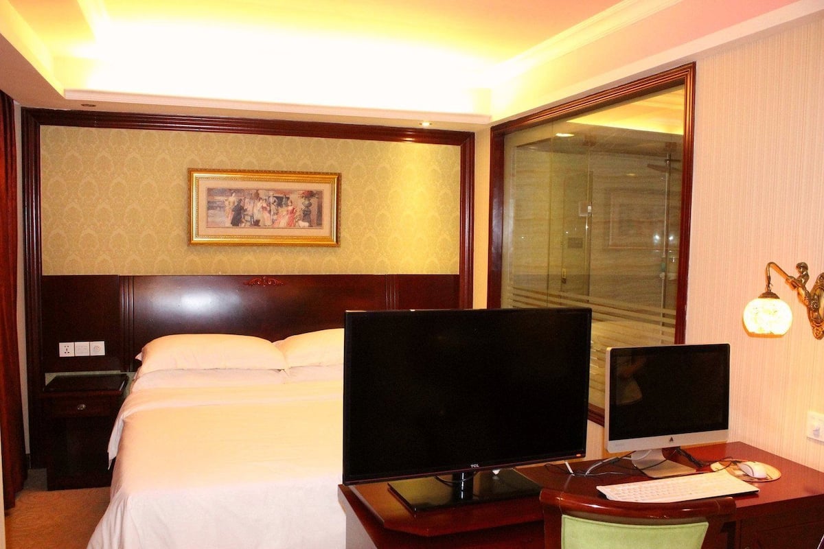 Executive kamer, 1 kingsize bed | Een bureau, verduisterende gordijnen, gratis wifi