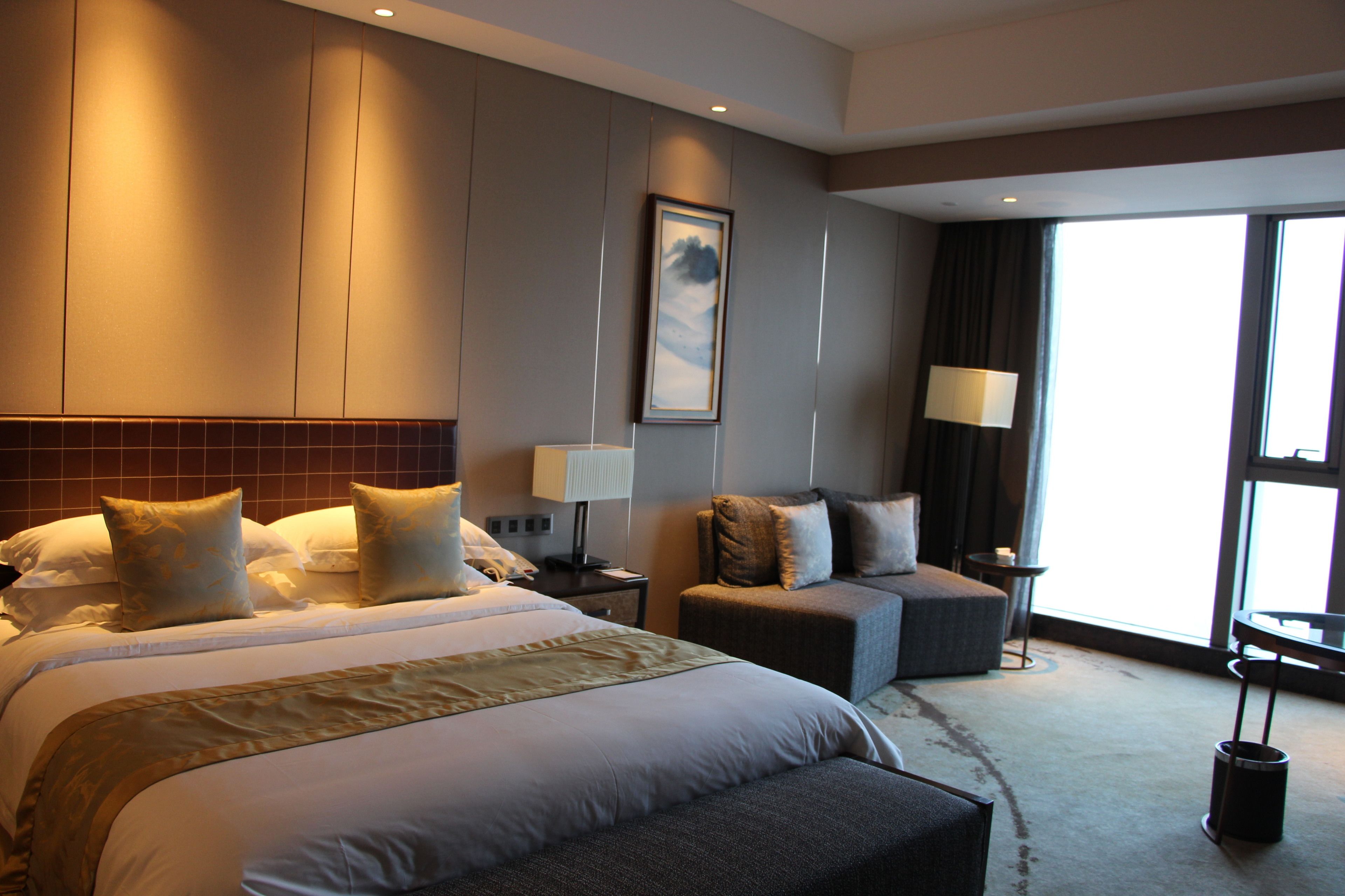 signature room, lake view | in-room safe, desk, blackout curtains, free wifi