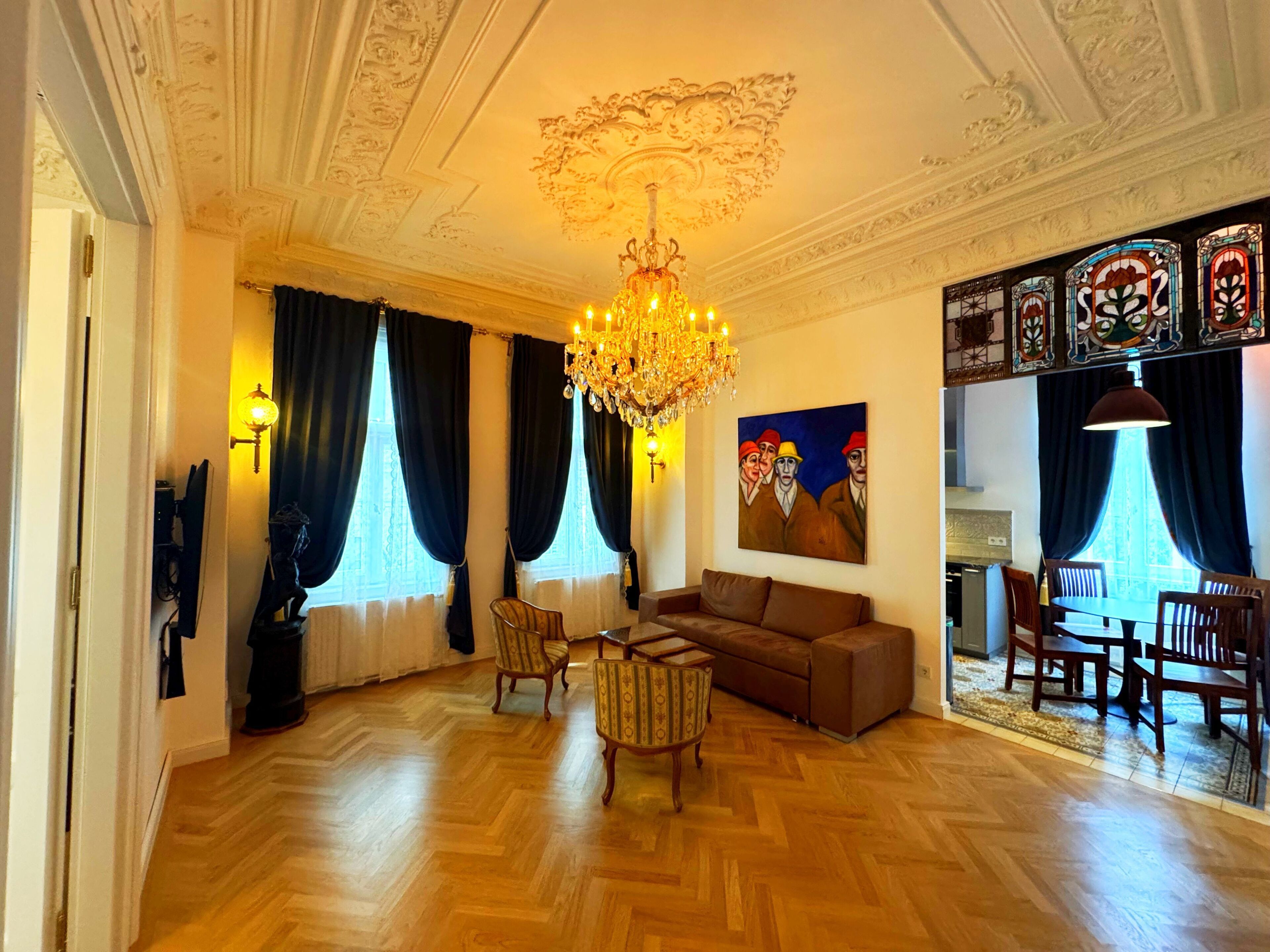 Deluxe Apartment | Living area | 50-inch flat-screen TV with cable channels, TV, video-game console