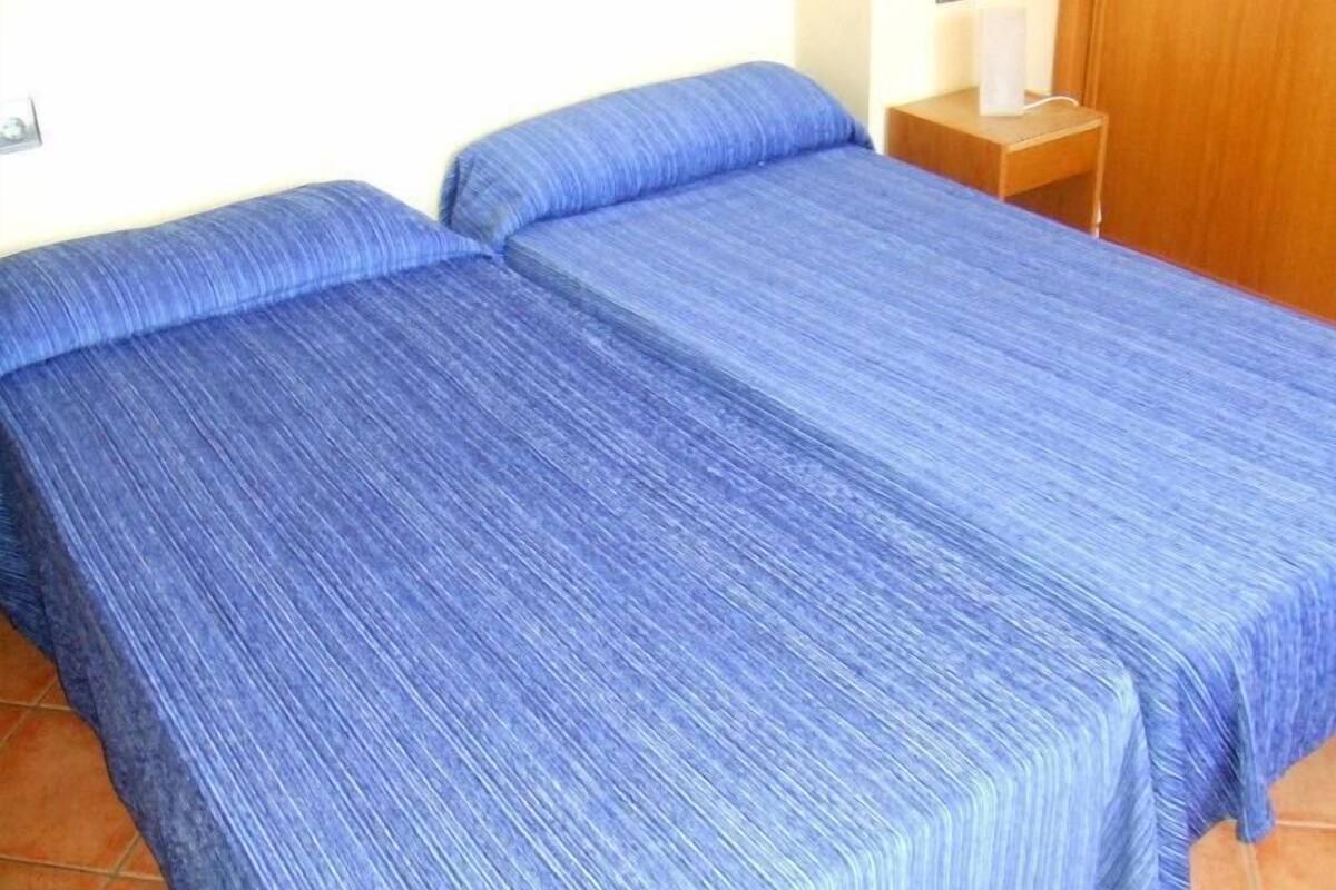Blackout curtains, WiFi, bed sheets