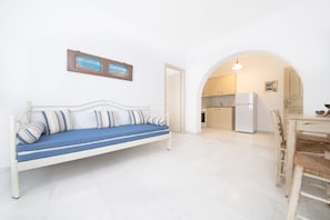 Apartamento Deluxe (Family) | Zona de estar | Una televisión LCD