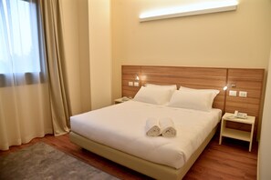 Premium bedding, minibar, desk, laptop workspace