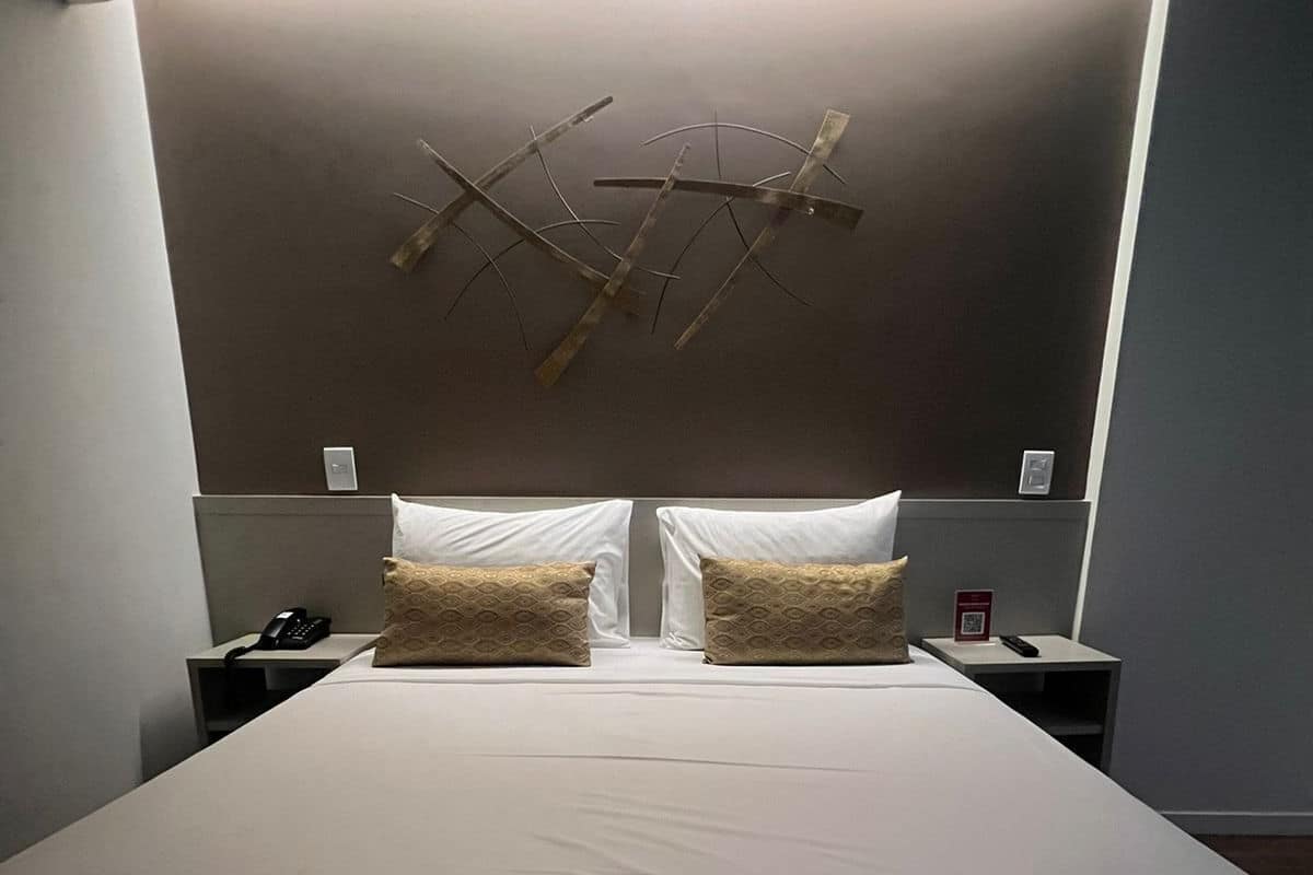 Standard Double Room | Minibar, in-room safe, desk, blackout drapes