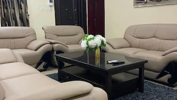 Business Apartment, 3 Bedrooms | Living area | Flat-screen TV