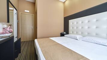Premium bedding, down duvets, minibar, in-room safe