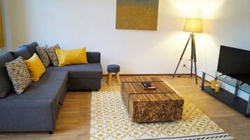 Appartement Duplex | Salle de séjour | Télévision à écran plat