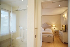 Royal Apartment, 2 Bedrooms | Bathroom | Combined shower/tub, free toiletries, hair dryer, bathrobes