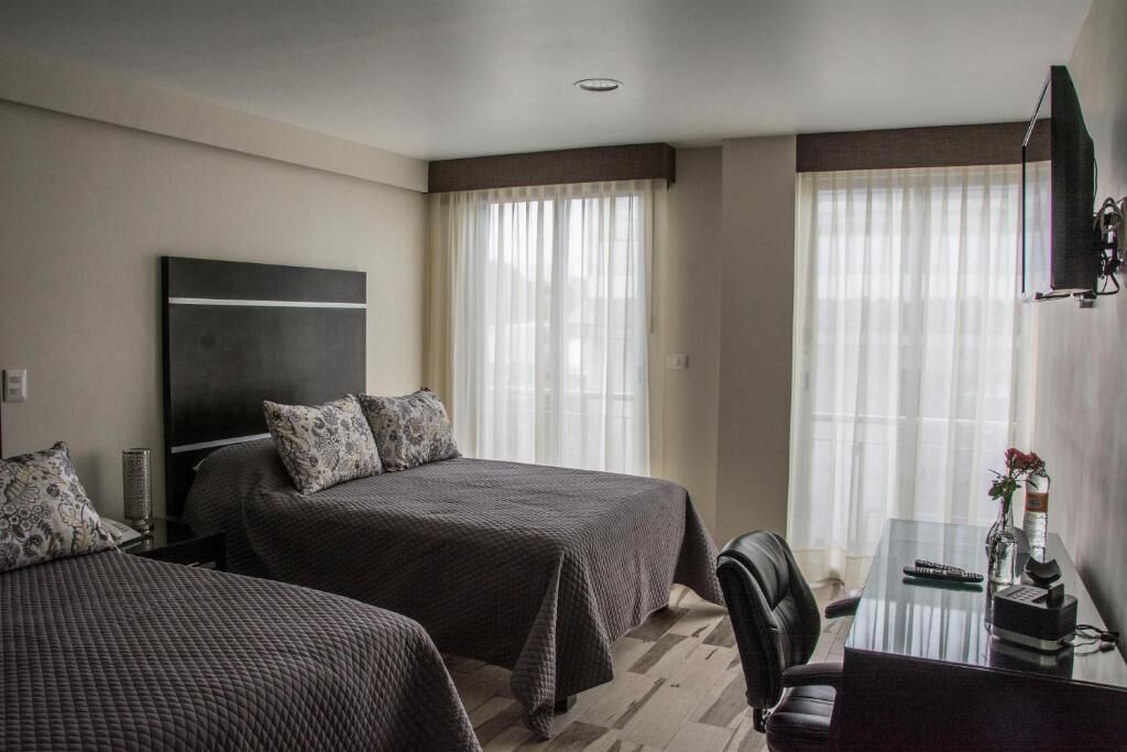 comfort quadruple room, 2 double beds | 1 bedroom, in-room safe, desk, iron/ironing board