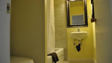 Room, 2 Double Beds | Bathroom | Shower, hair dryer, towels