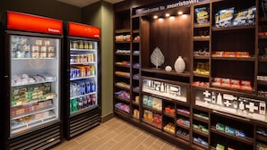 A well-stocked convenience store with refrigerated sections, shelves of snacks, and a variety of beverages. - Hampton Inn Morristown, I-81 (Morristown)