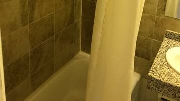 Room, 1 King Bed, Hot Tub | Bathroom | Combined shower/bathtub, deep-soaking bathtub, towels