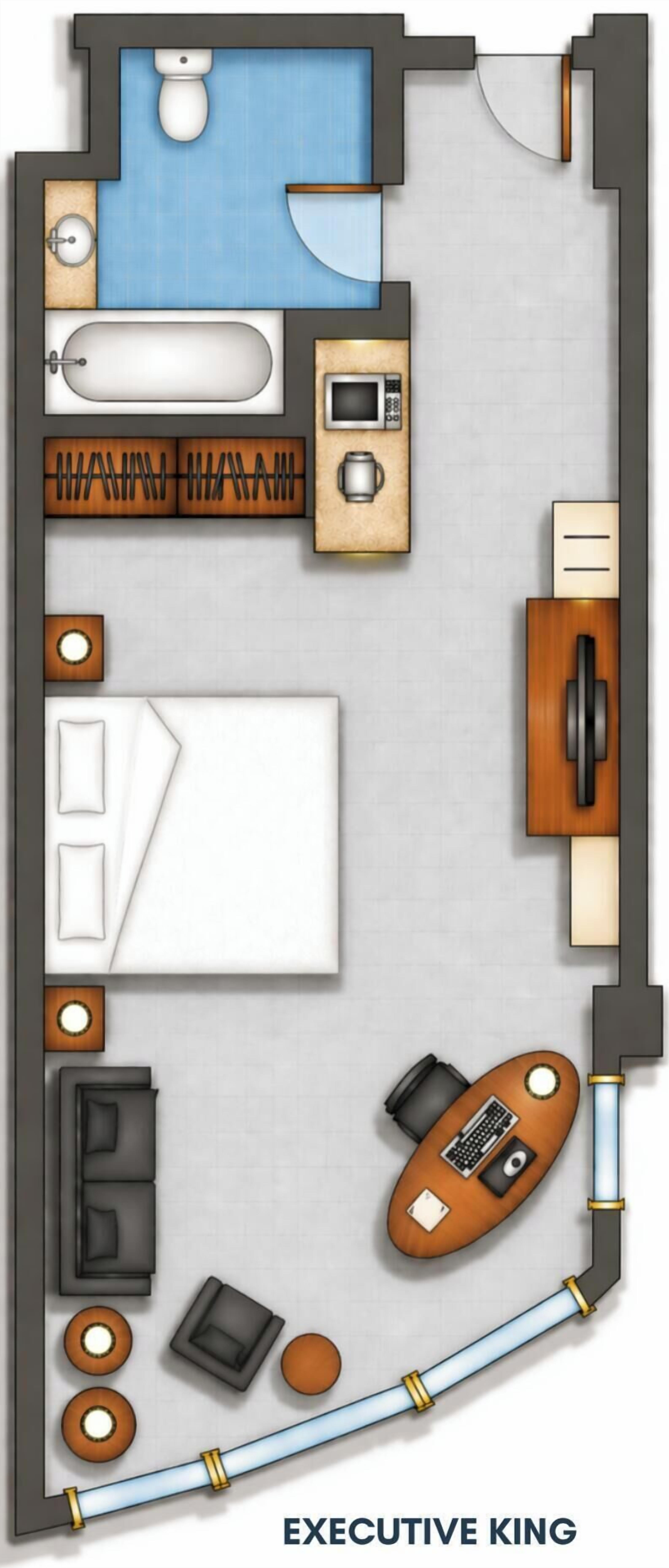Indeling van een hotelkamer met een badkamer, kitchenette, een bank, een bureau en een zithoekje.