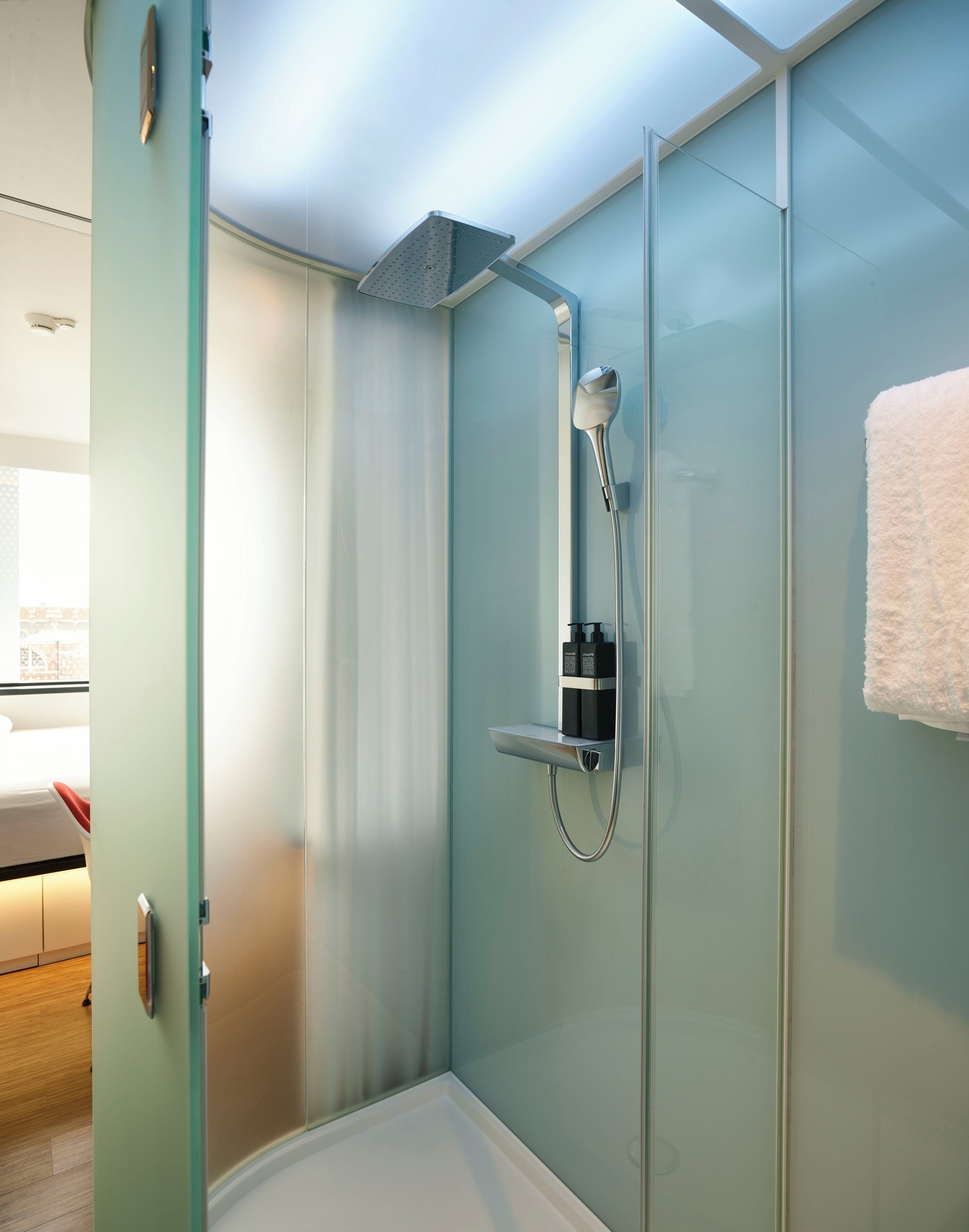 king room | bathroom | shower, hydromassage showerhead, eco-friendly toiletries, hair dryer