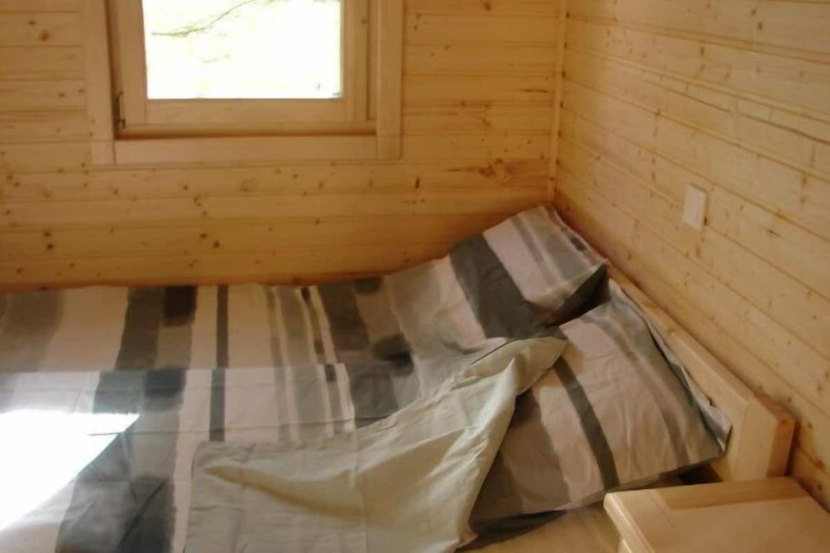 Premium bedding, blackout curtains, soundproofing, iron/ironing board