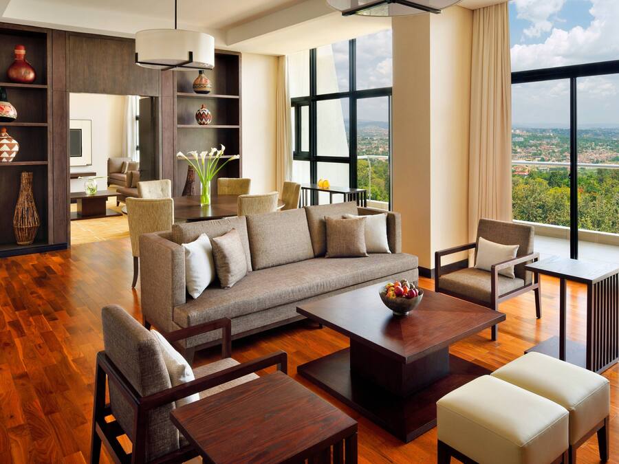 Executive Suite, 1 Bedroom | Living area | 32-inch LCD TV with cable channels, TV