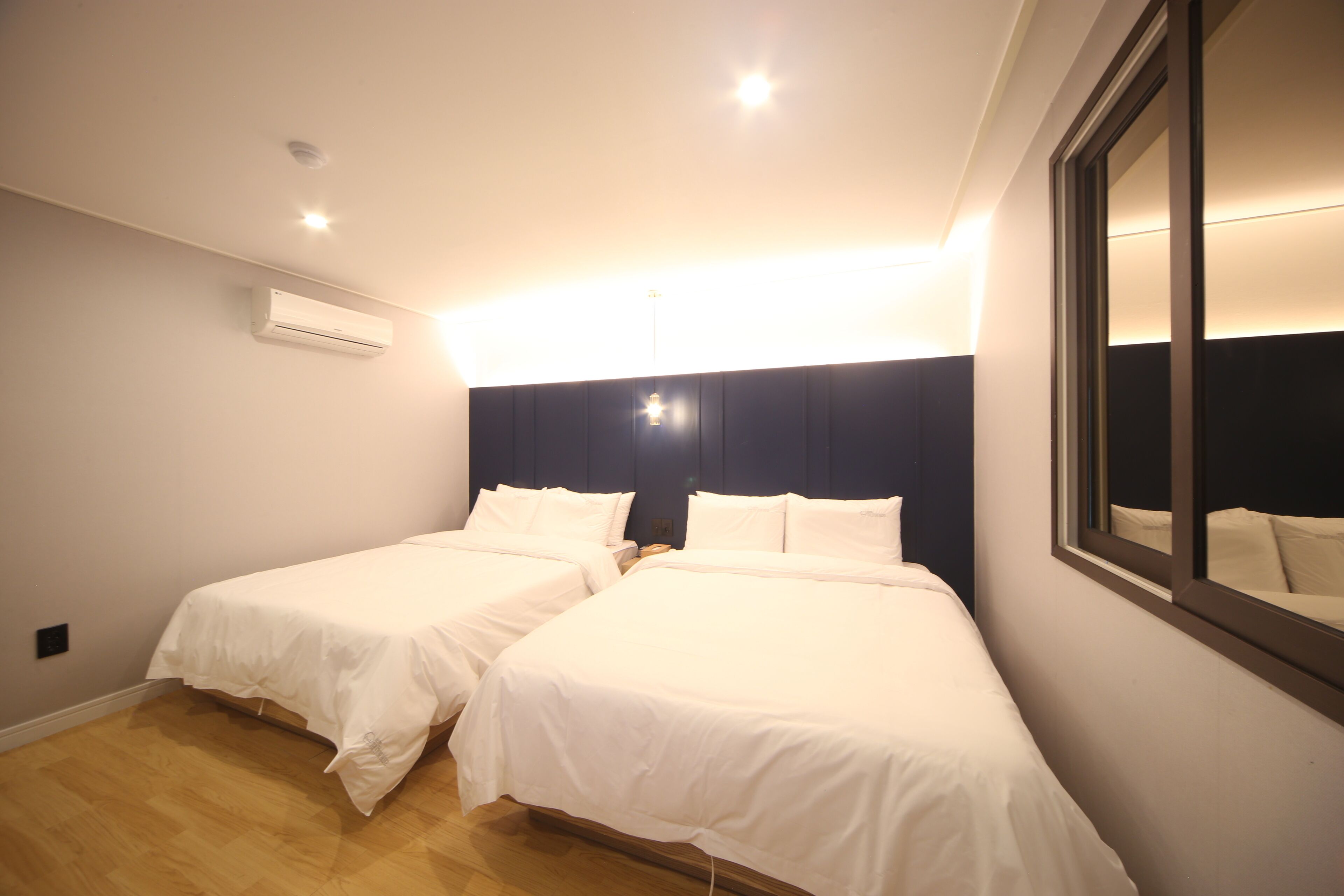 business twin room, 2 queen beds | premium bedding, desk, soundproofing, free wifi