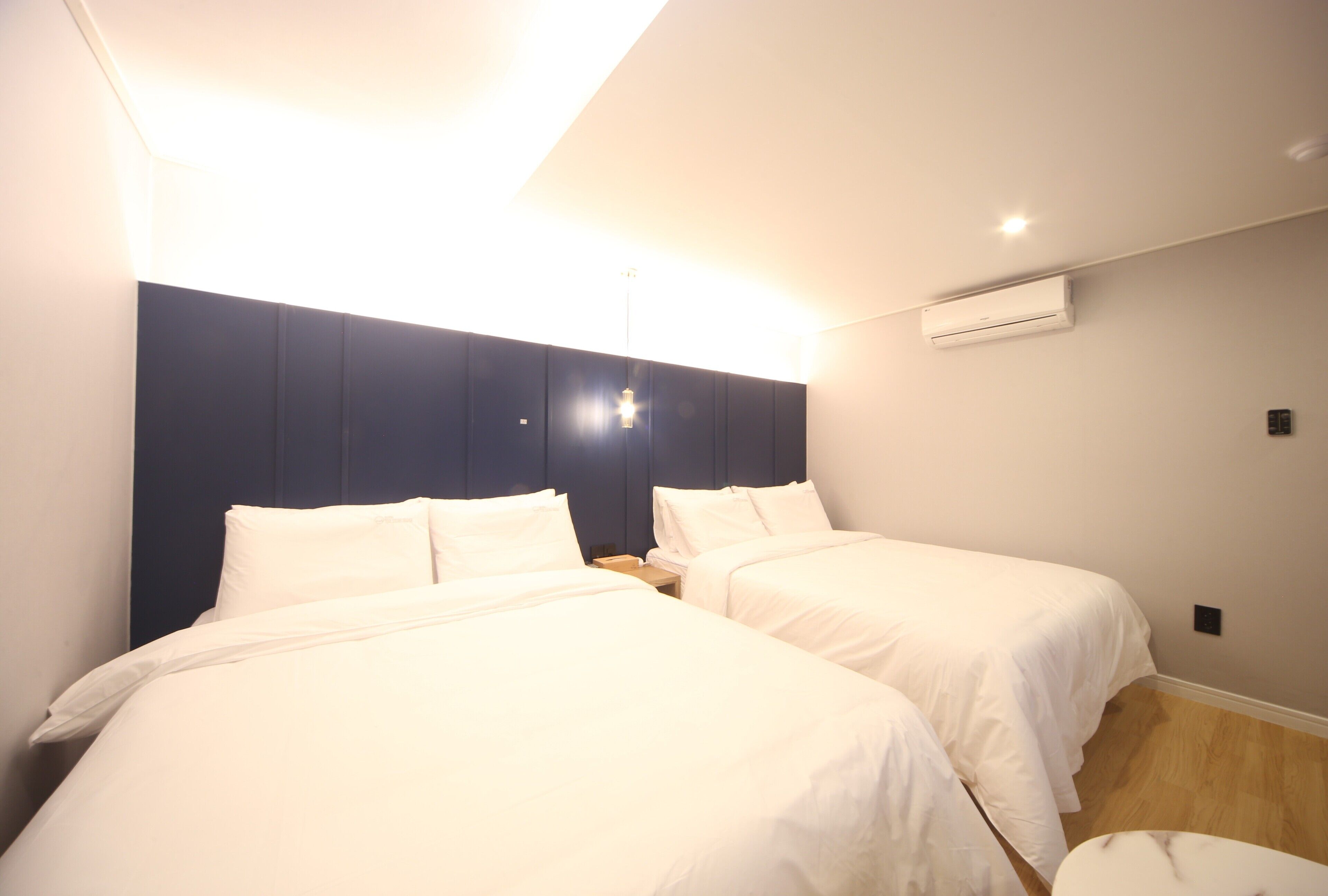premium twin room, 2 queen beds | premium bedding, desk, soundproofing, free wifi