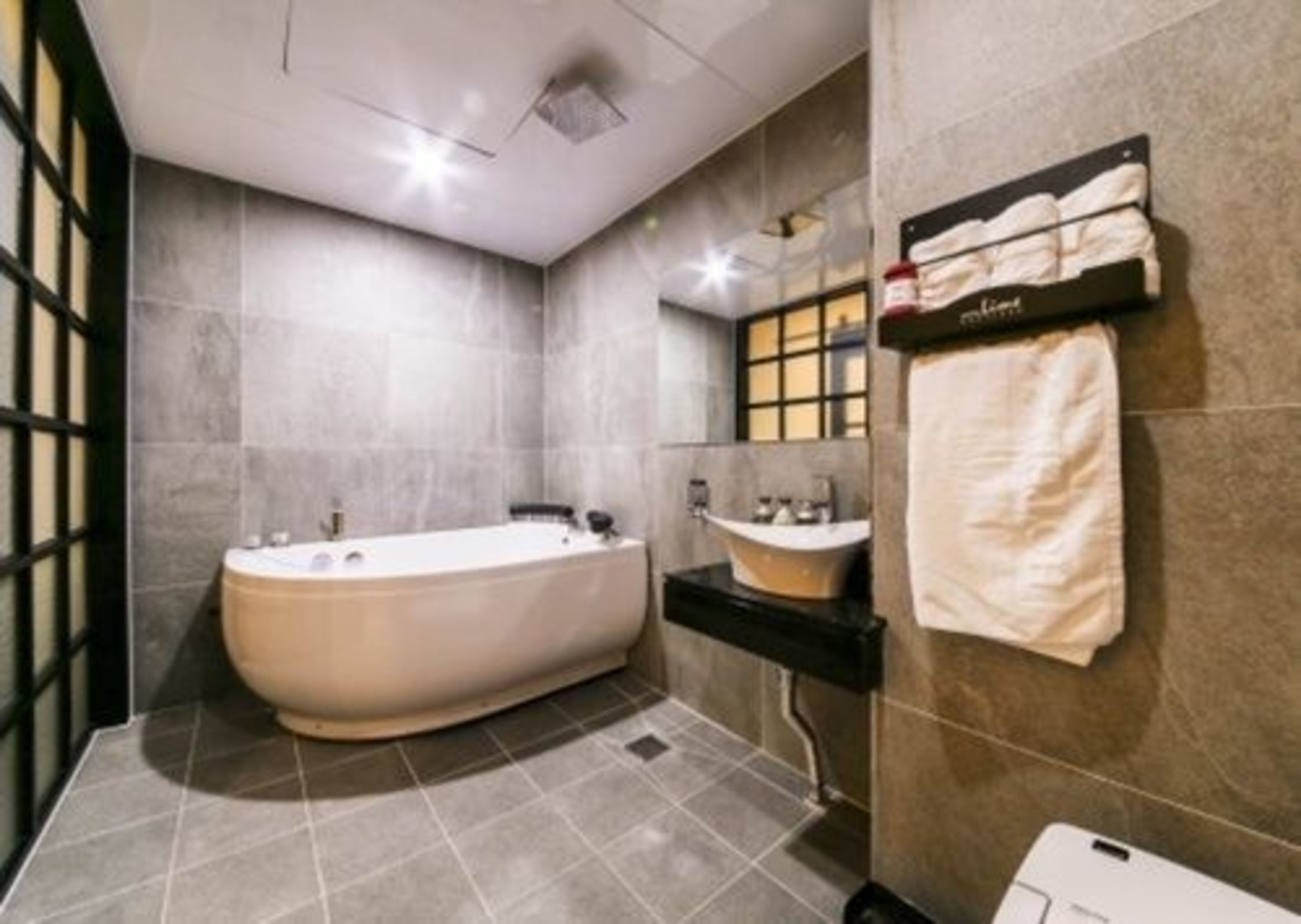 suite (modern) | bathroom | shower, free toiletries, hair dryer, bathrobes