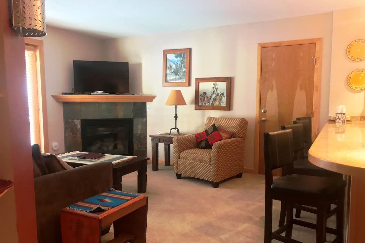 Condo, 2 Bedrooms | Living area | Flat-screen TV, fireplace