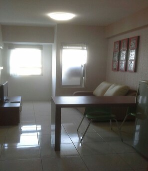 Apartemen, 2 kamar tidur | Area keluarga | TV LCD