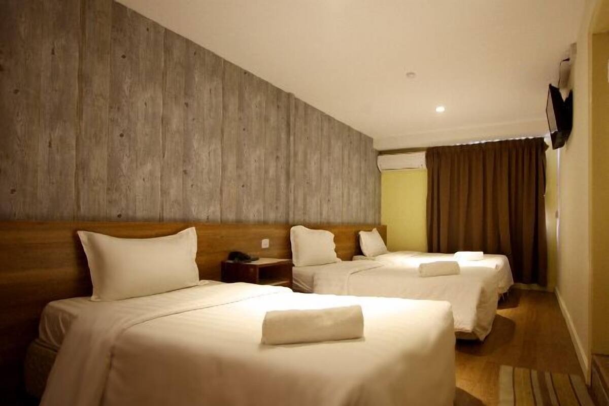 Triple Single Deluxe