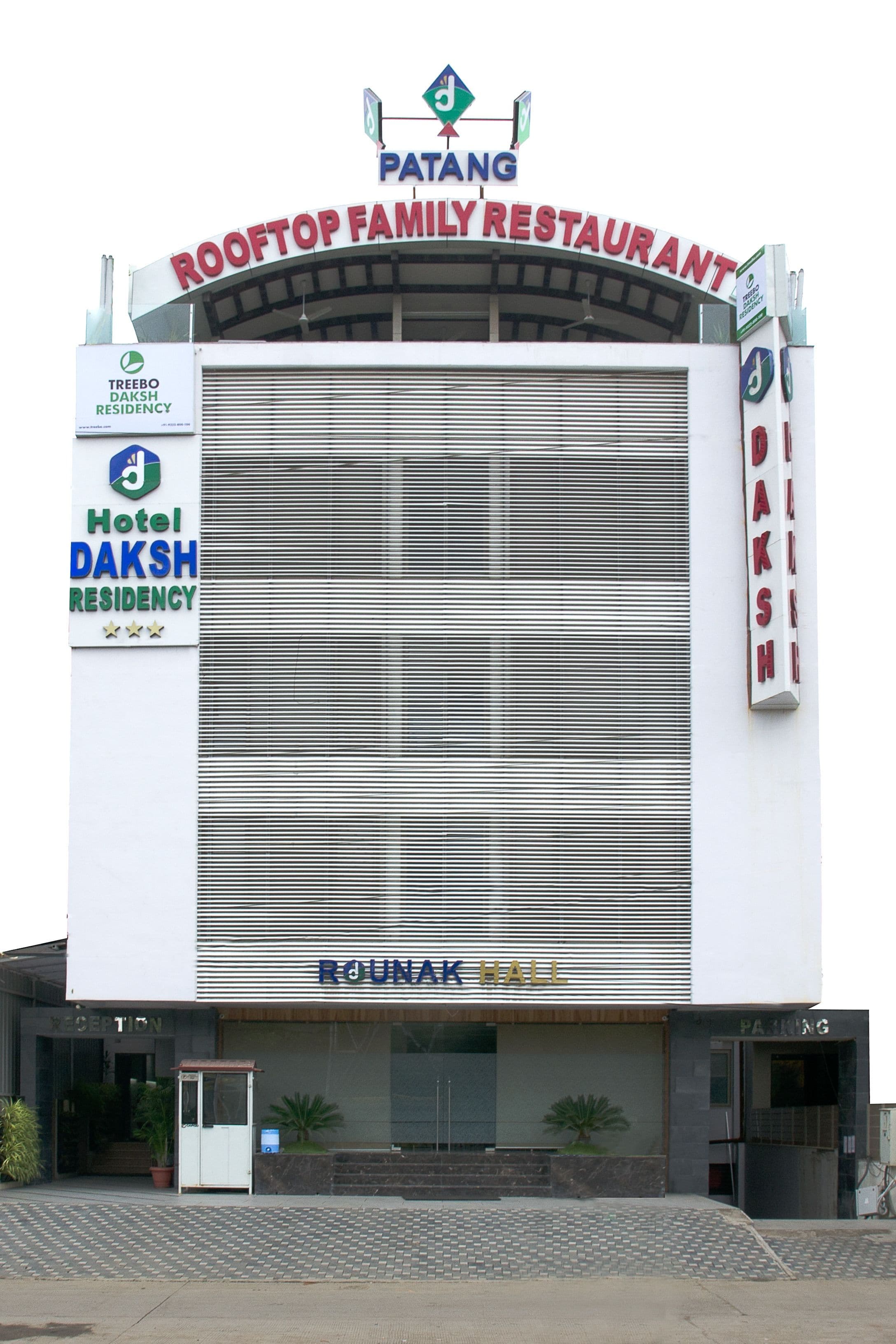 A building with a sign for Patang Rooftop Family Restaurant and Hotel Daksh Residency.