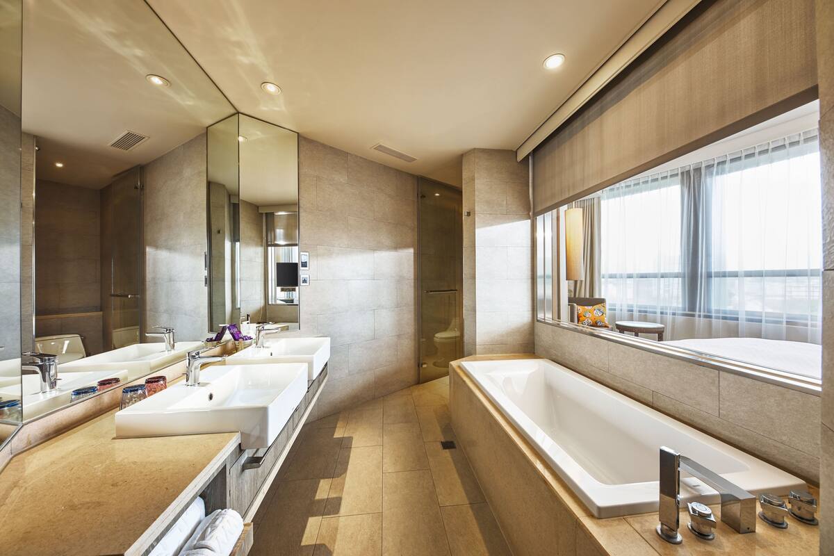 cham cham suite | bathroom | shower, hair dryer, electronic bidet, towels