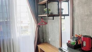 Blackout drapes, iron/ironing board, free WiFi, bed sheets