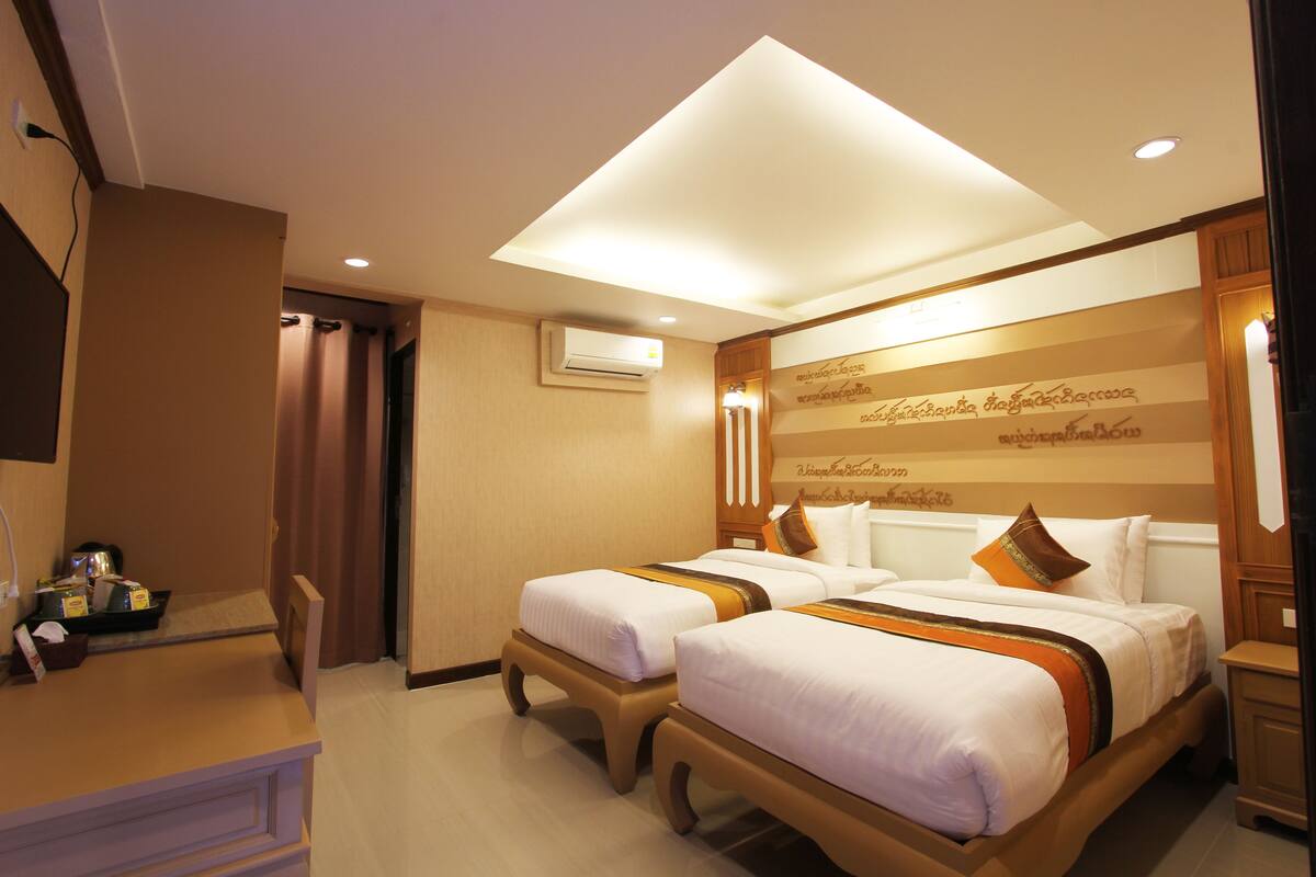 Fa-Lai Twin Room | Artículos del minibar gratis y caja de seguridad en la habitación