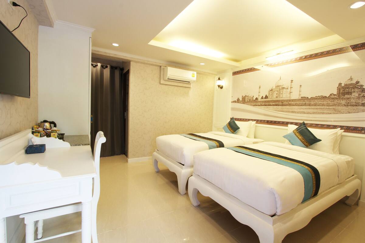 Gula-Dum Twin Room | Artículos del minibar gratis y caja de seguridad en la habitación
