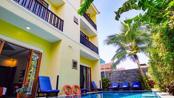 Outdoor pool, open 9 AM to 9 PM, pool umbrellas, sun loungers