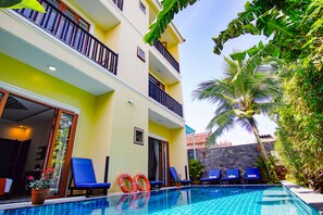 Outdoor pool, open 9 AM to 9 PM, pool umbrellas, sun loungers