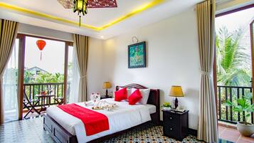 Connecting Family Suite with Garden View | Down comforters, minibar, in-room safe, individually decorated