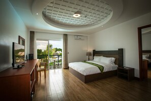 Deluxe Room | In-room safe, desk, blackout drapes, bed sheets - Gabi Resort & Spa (Cordova)
