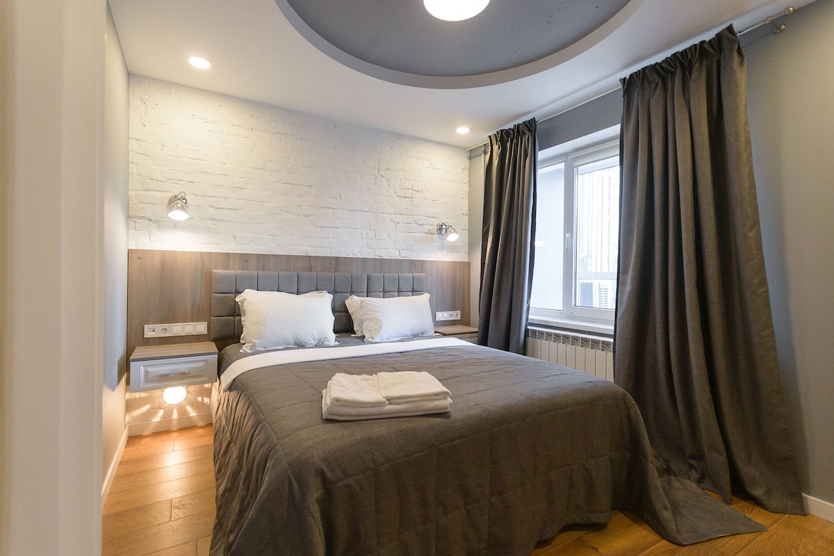 Panoramic Apartment, 1 Bedroom, City View | Iron/ironing board, cribs (free), WiFi (free), individually decorated
