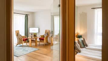 Suite, Balcony, Garden Area | Living area | Flat-screen TV