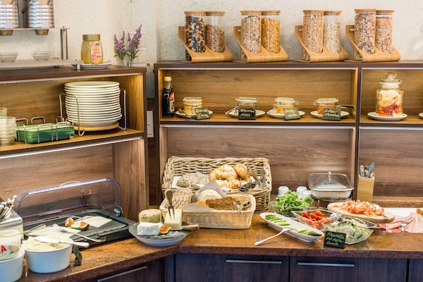 Daily buffet breakfast (EUR 15 per person)