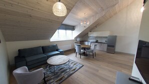 Superior Loft, 3 Bedrooms | Living area - Minthouse apartments (Vilnius)