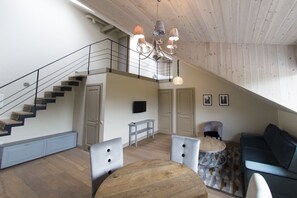 Superior Loft, 3 Bedrooms | Living area | Flat-screen TV - Minthouse apartments (Vilnius)