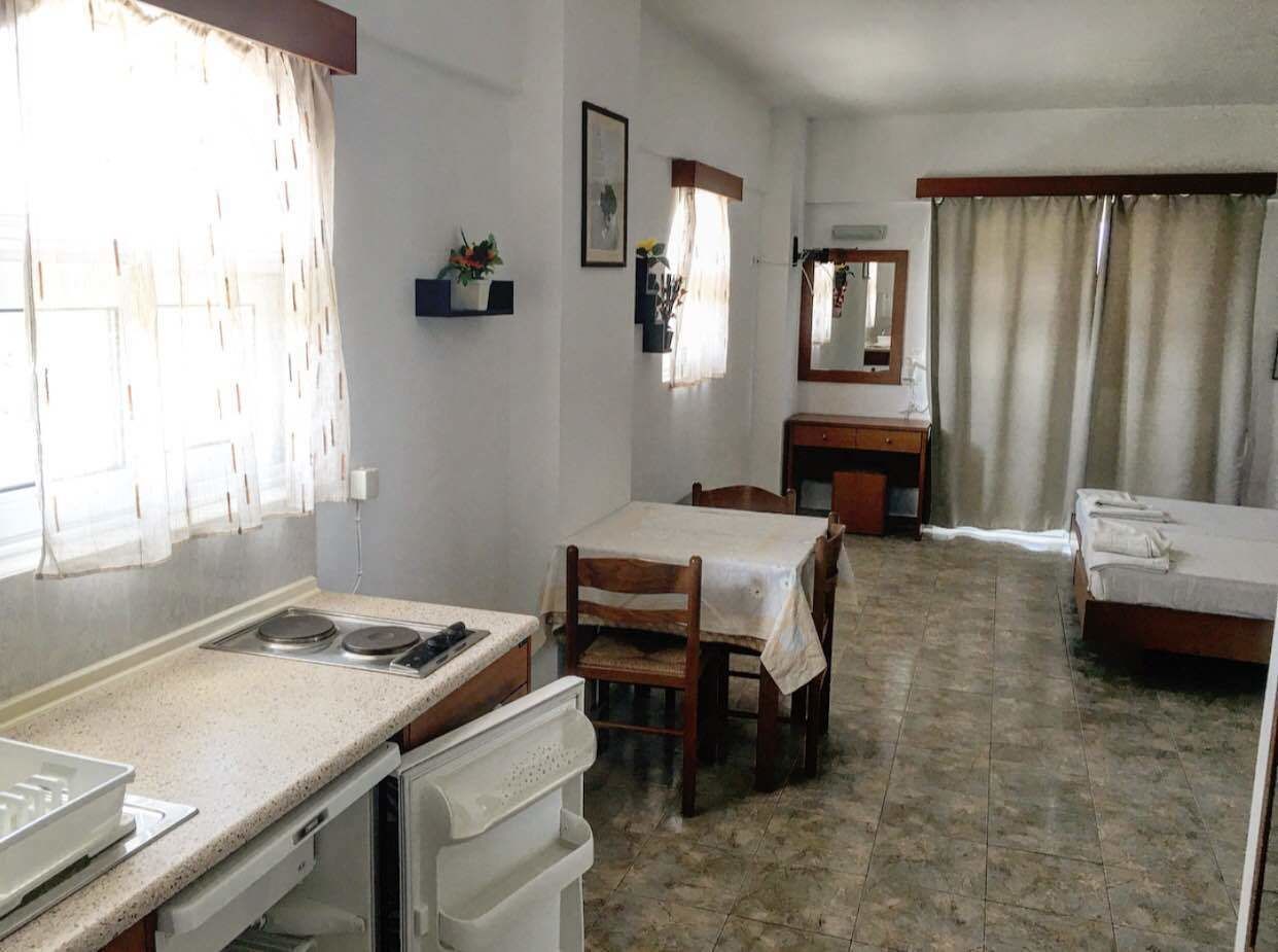 standard room, sea view | living area | tv