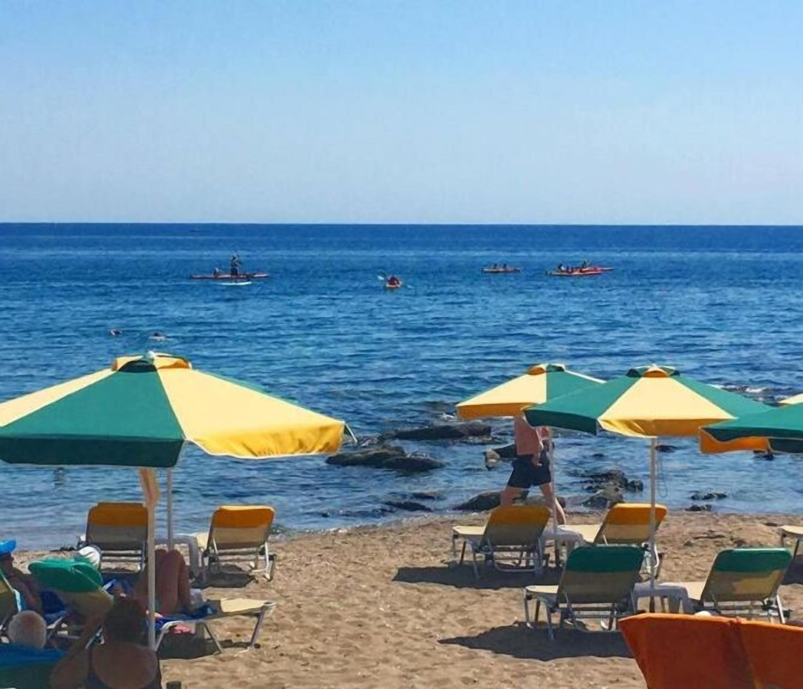on the beach, black sand, beach bar