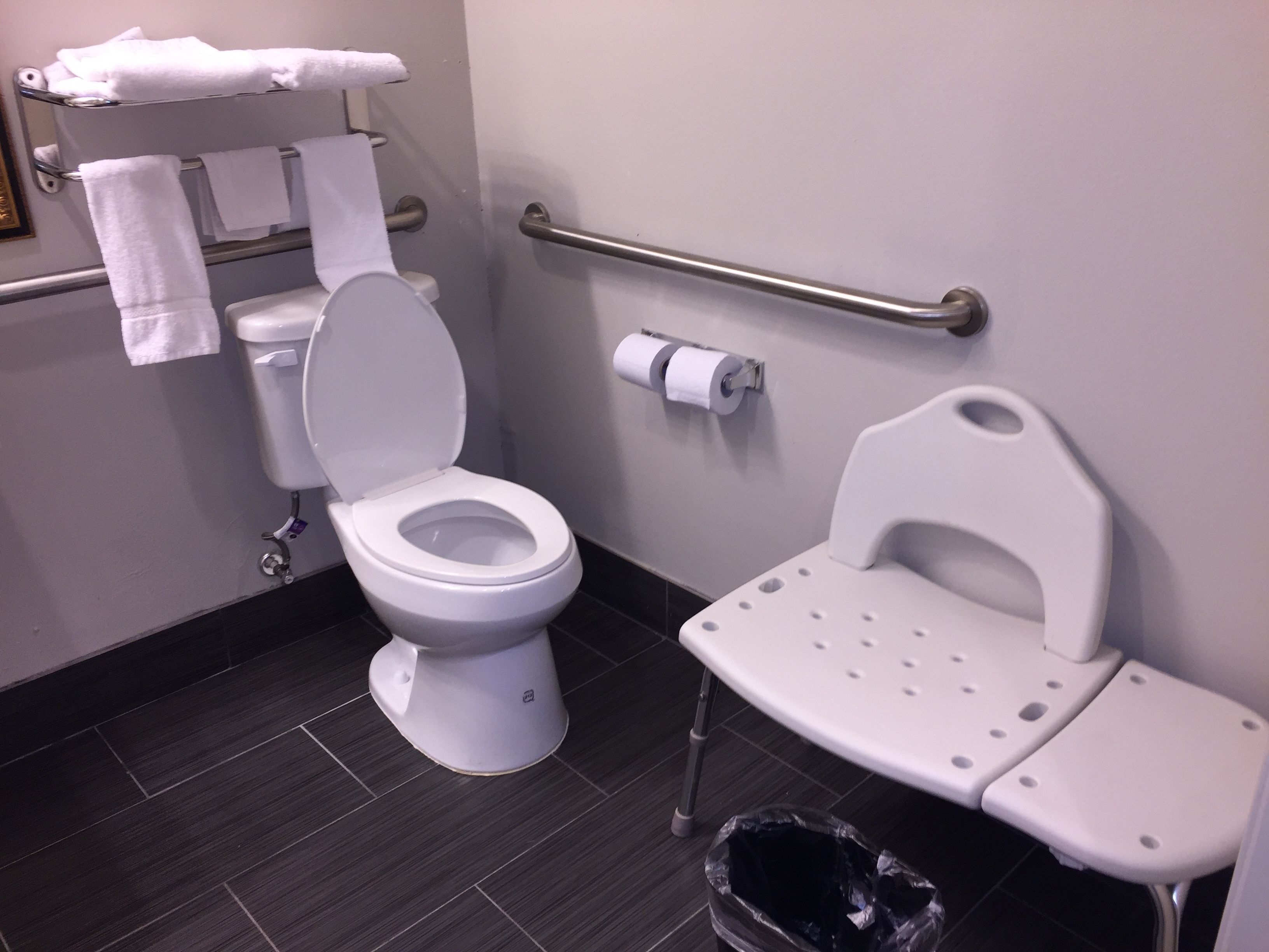 queen room with 2 queen beds | bathroom | combined shower/bathtub, free toiletries, towels