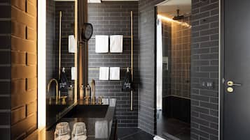 Designer toiletries, hair dryer, towels